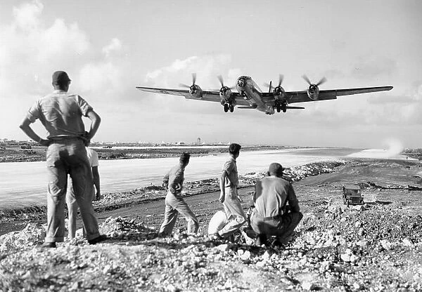 Boeing B-29 (forward view) climbing out of Saipan, Dec