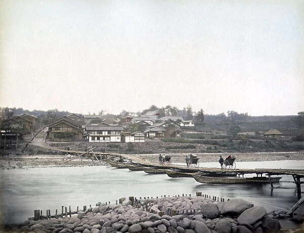 Bridge of boats, Japan, circa 1880s. Date: circa 1880s