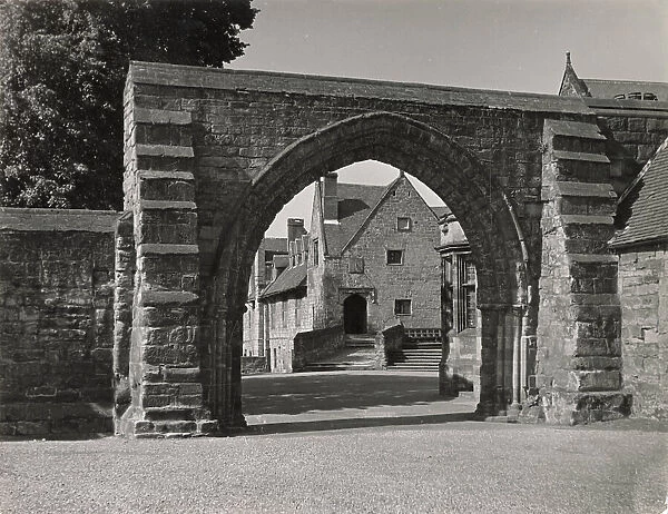 The Gateway to Repton School, which was founded in 1557. The original school is on the site of an 11th century priory, some of whose buildings are still in daily use. Date: 1950s