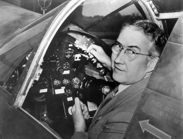 Glenn L Martin sitting in the cockpit of a Martin bomber