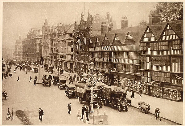 Holborn showing Staple Inn and Roneo an office appliance shop. Date: 1937