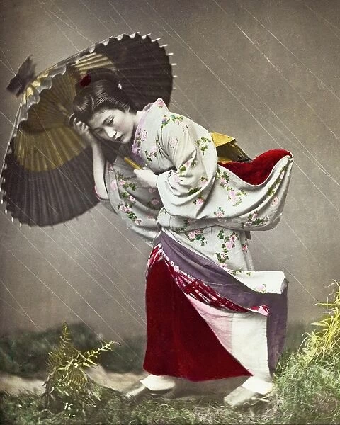Japanese woman in a rainstorm