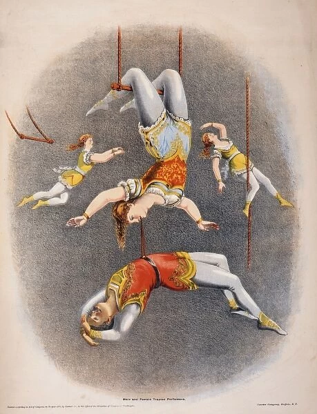 Male and female trapeze performers