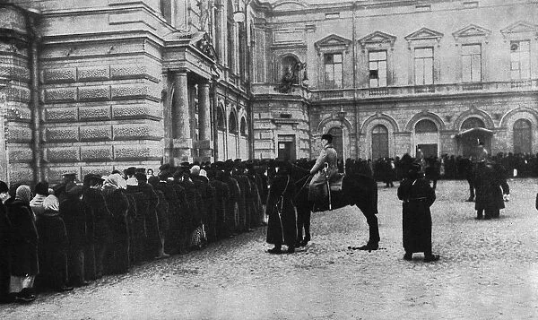 People queueing for bread with police guard, Russia, WW1