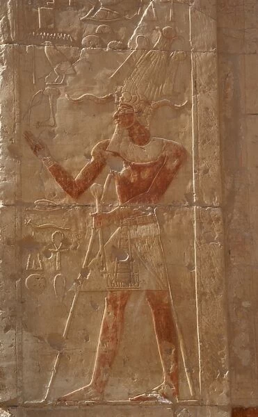 Pharaoh with the false beard and Atef crown. Deir el-Bahari