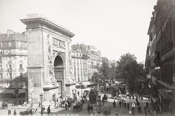 Porte Saint Denis, with busy traffic, Paris France