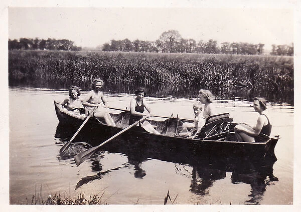 Six in rowing boat