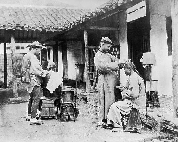 Street barbers at work, China