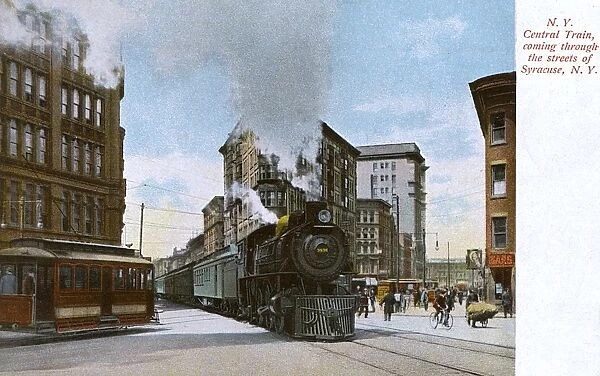 Train in street, Syracuse, New York State, USA