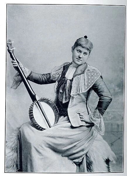 Woman posing with banjo