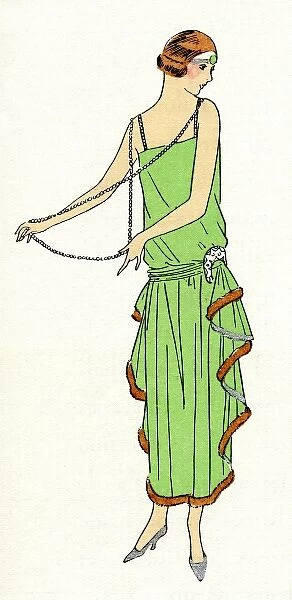 Young lady in green theatre dress by Beer