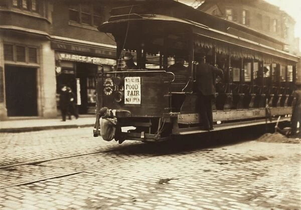 Child riding on a tram, Boston, 1909 C014  /  2047