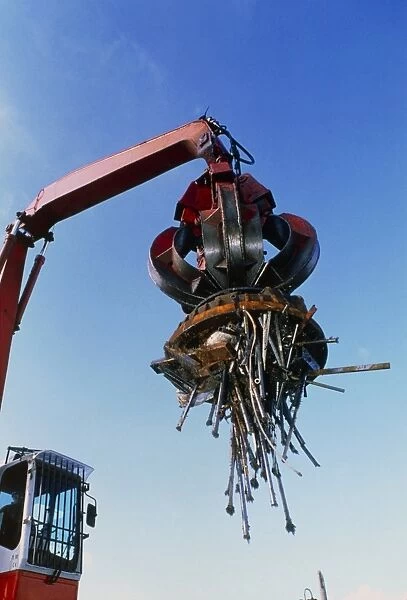 Large electromagnet in use at a scrapyard