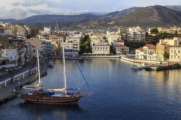 Attractive harbour and town backed by mountains, from Mirabello Bay, Agios Nikolaos