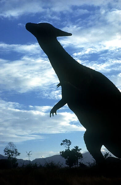 20024491. CUBA Santiago de Cuba Baccanao Life size dinosaur silhouetted in amusement park