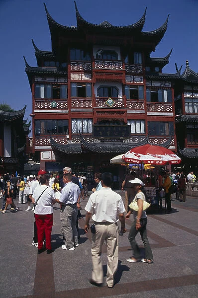 20087524. CHINA Shanghai Yu Gardens street scene with shoppers tourists shops