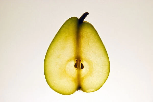 Food, Fruit, Pear, Sliced section on lightbox showing stalk, core and pips