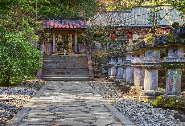 Stone path and red Japanese temple
