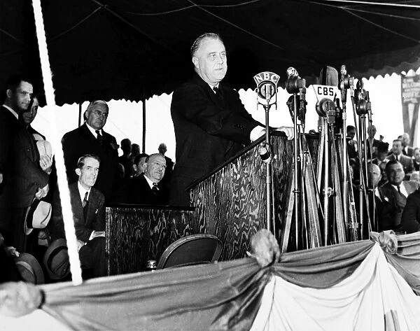 (1882-1945). 32nd President of the United States. Roosevelt making a dedicatory speech at the Centennial Bridge over the Chicago River. Photographed 5 October 1937