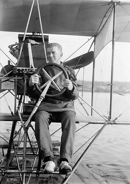 (1885-1928). American aviator and the first United States Navy officer designated as an aviator. Testing a seaplane on the Potomac River. Photograph, 1911