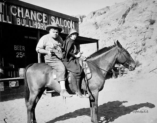 (1887-1933). American cinema actor. Arbuckle and Alice Lake in Out West, 1918