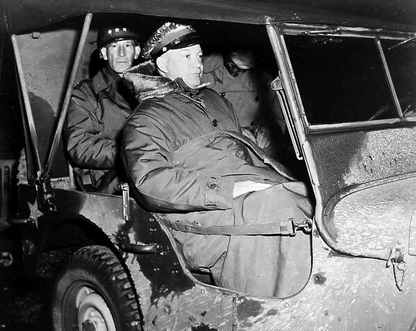 (1890-1969). 34th President of the United States. General Eisenhower, with Lieutenant General Raymond Stallings McLain in the back seat, proceeds to the front in November, 1944