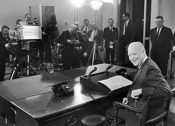 (1890-1969). 34th President of the United States. Eisenhower at his farewell radio-television address to the nation, 17 January 1961, in which he warned the American public about the potential dangers of the military-industrial complex. To his right is Press Secretary James Hagerty