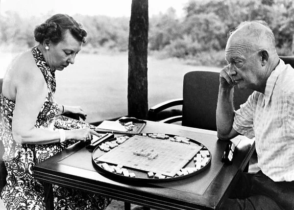 (1890-1969). 34th President of the United States. Eisenhower and his wife, Mamie, playing Scrabble. Photograph, mid 20th century
