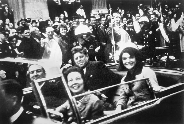 35th President of the United States. Kennedy and his wife, Jacqueline, with Texas Governor John Connally and his wife, Nellie, riding in an open car through Dallas, Texas, shortly before Kennedys assasination on 22 November 1963. Photograph by Victor Hugo King