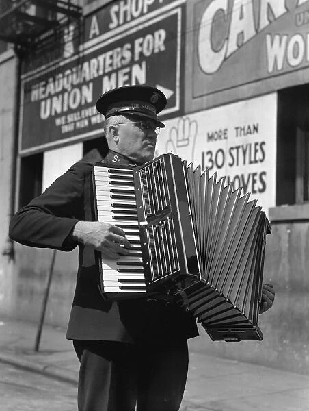 ACCORDION PLAYER, 1939. Salvation Army street band, San Francisco, California