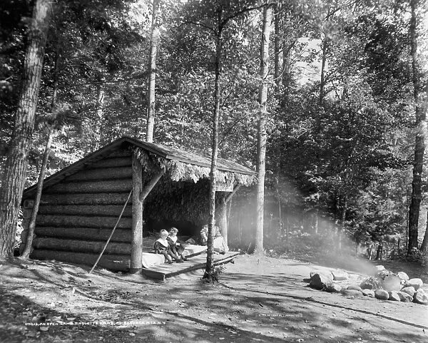 ADIRONDACKS: CABIN, c1909. A lean-to cabin on Raquette Lake in the Adirondacks, New York