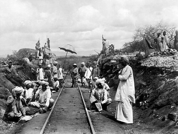 AFRICA: RAILWAY, c1905. East Indian laborers cutting rock during the construction of the Uganda Railway in British East Africa, c1905