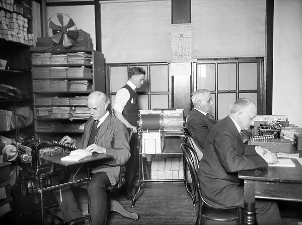 AGRICULTURE CENSUS, c1916. Men tabulating data of an agricultural census, c1916