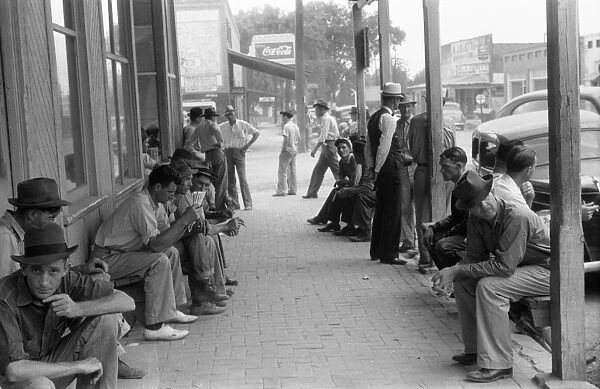 ALABAMA: WORKERS, 1941. A group of men, some of them unemployed, on the main street