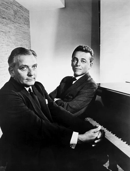 ALAN JAY LERNER (1918-1986). American composer and dramatist. Lerner, right, and Frederick Loewe (1901-1989), American (Austrian-born) composer