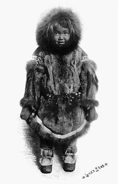 ALASKA: ESKIMO CHILD. Eskimo child dressed in traditional fur clothing, Nome, Alaska