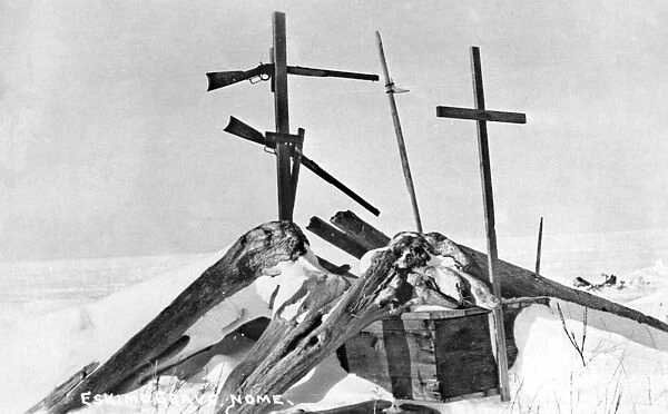 ALASKA: ESKIMO GRAVE. An Eskimo grave in Nome area, Alaska. Photographed by the Lomen Brothers