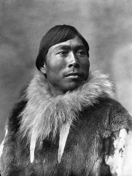 ALASKA: ESKIMO MAN, c1903. Eskimo man wearing fur clothing, Alaska