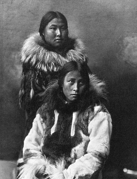 ALASKA: ESKIMOS, c1903. Two Eskimo women in traditional fur clothing, Nome, Alaska