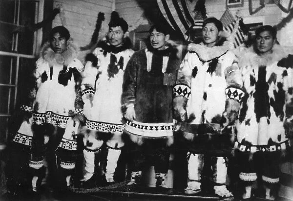 ALASKA: ESKIMOS, c1916. A group of Eskimos modeling their reindeer skin clothing in a contest