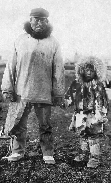 ALASKA: ESKIMOS. Eskimo father and daughter, Alaska. Photograph, early 20th century