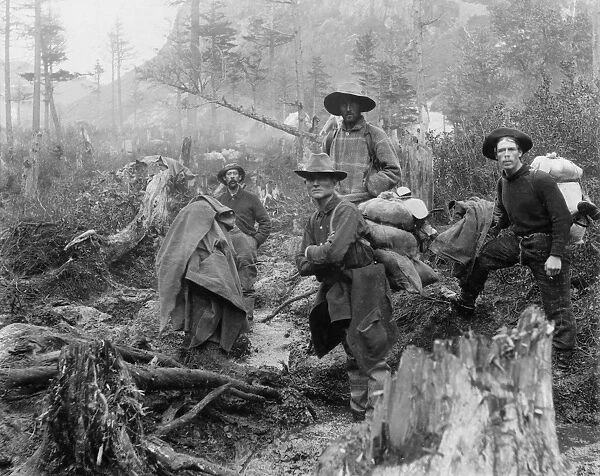 ALASKA: PROSPECTORS, c1897. Four prospectors on a trail in Alaska. Photograph, c1897