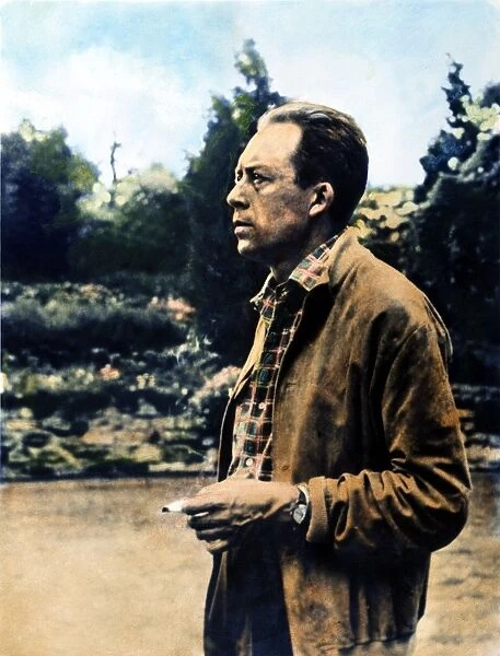 ALBERT CAMUS (1913-1960). French novelist, essayist, and playwright. Oil over a photograph, n. d