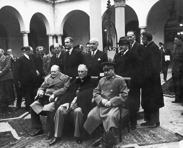 Allied leaders photographed at the Livadia Palace at Yalta, Crimea, during the Yalta Conference, February 1945. Seated from left: British Prime Minister Winston Churchill, U. S. President Franlin Roosevelt, and Soviet Premier Joseph Stalin