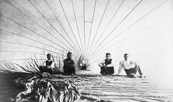 American aeronauts John G. Doughty and Alfred E. Moore photographed with two assistants inside their hot air balloon before a flight over Connecticut, 1886