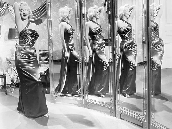 American cinema actress. In a scene from How to Marry A Millionaire, 1953