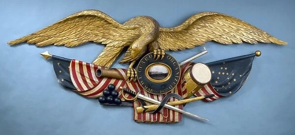 AMERICAN EAGLE, 1855. Wooden American eagle and flag, 1855