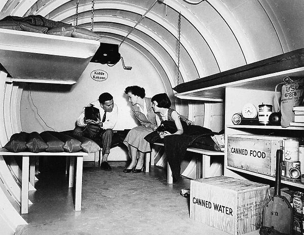 An American family in a backyard bomb shelter, Garden City, New York, 1955