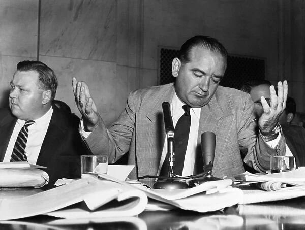American politician. Senator McCarthy (right) and aide Francis Carr (left) during the Army-McCarthy hearings. The Army accused McCarthy and staff of seeking special treatment for Private G. David Schine, a chief consultant to the Senate Permanent Subcommittee on Investigations while searching for Communists. 29 April 1954