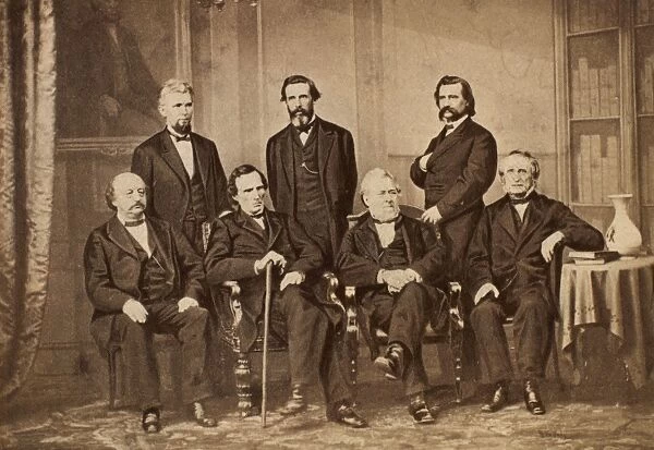 The Andrew Johnson Impeachment Committee, photographed in 1868 by Mathew Brady. Left to right, seated: Benjamin F. Butler, Thaddeus Stevens, Thomas Williams, John A. Bingham. Standing: James F. Wilson, George S. Boutwell, John A. Logan